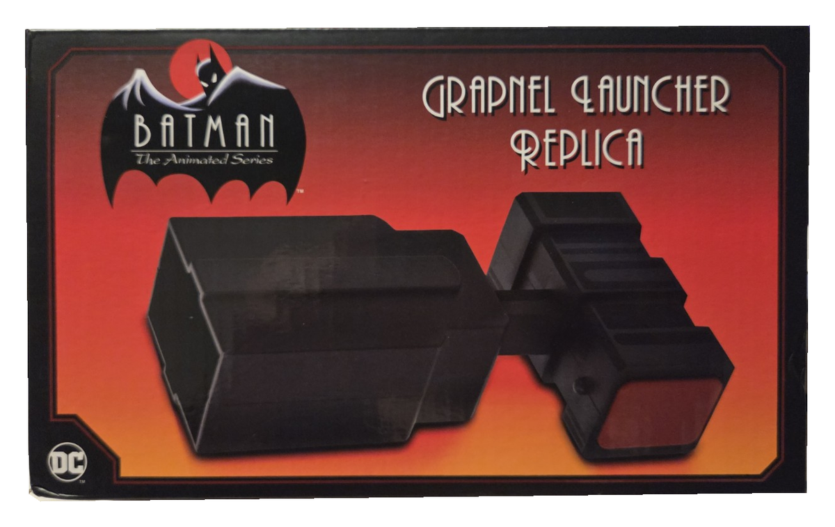 NECA Batman The Animated Series Grapnel Launcher box front, showing original packaging wear