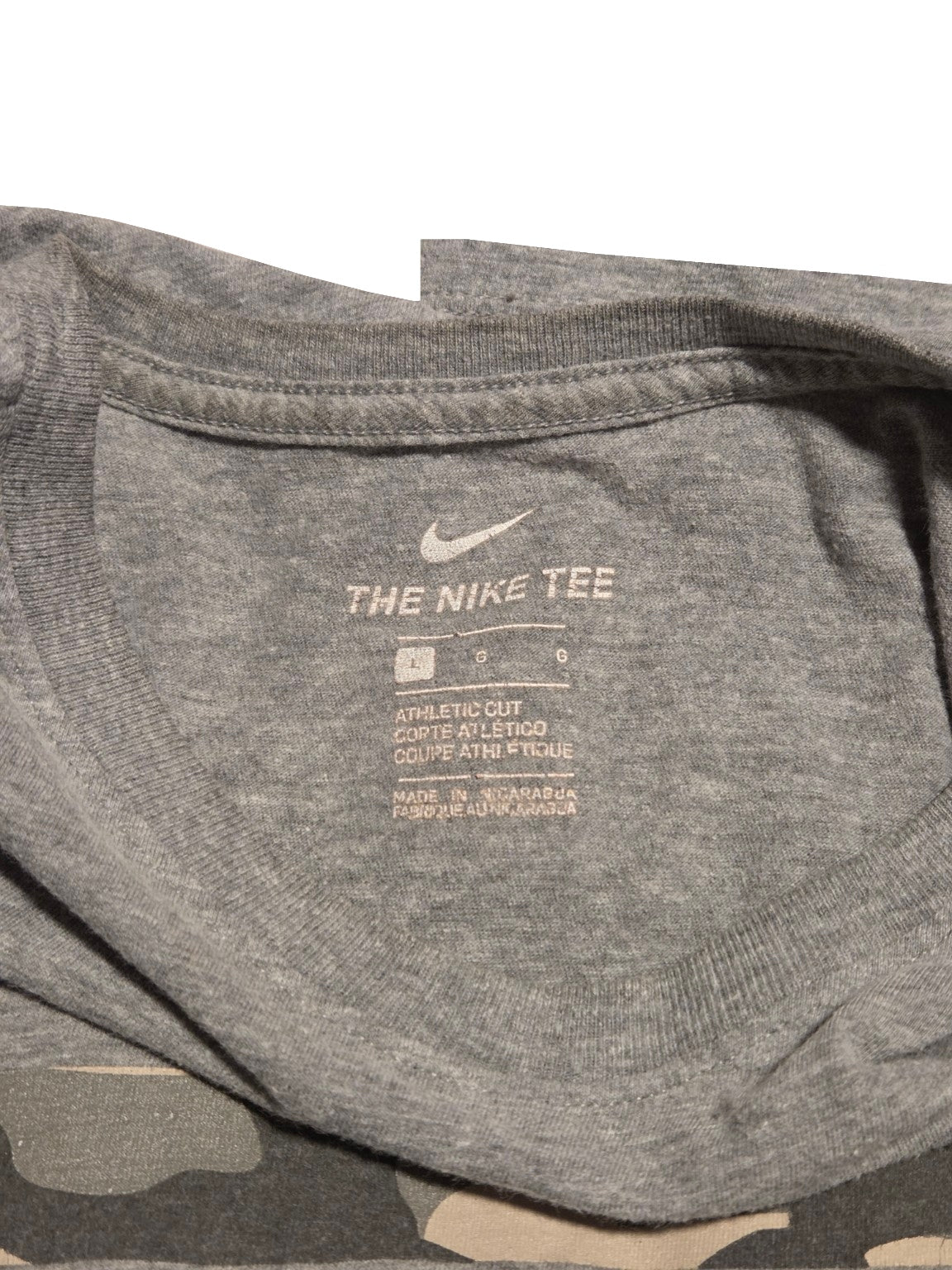 Nike Always a Marine gray large T-shirt label on white background
