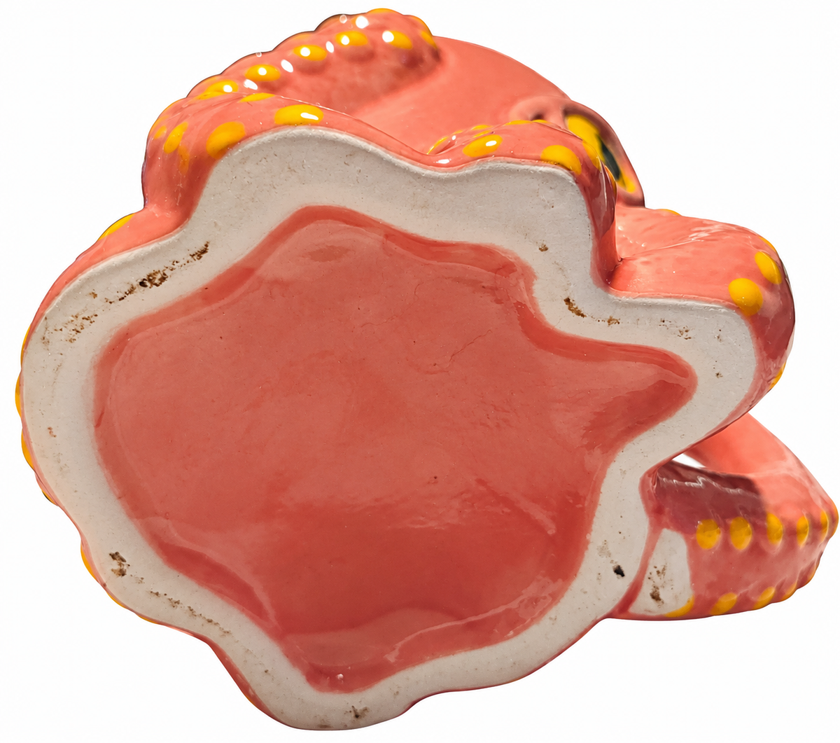 Octopus mug underside showing base scuffs on white