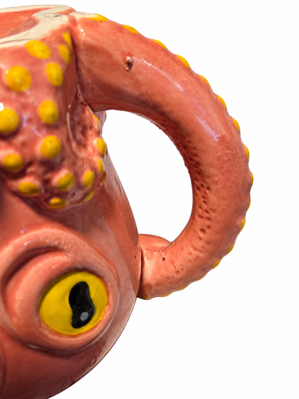 Octopus mug handle closeup showing small glaze pits and fine lines