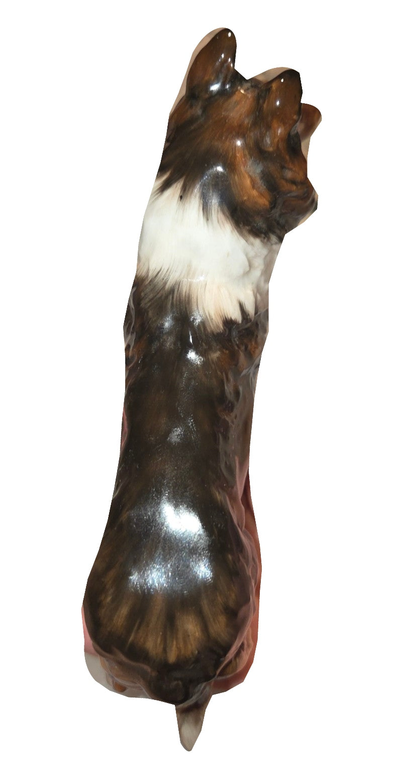 Royal Doulton collie figurine top view on white background