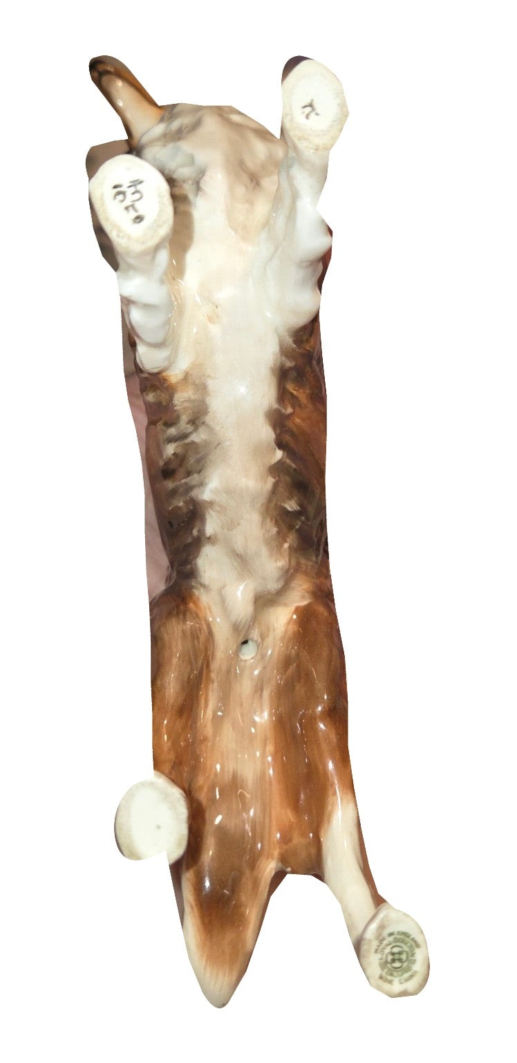 Royal Doulton collie figurine underside view on white background