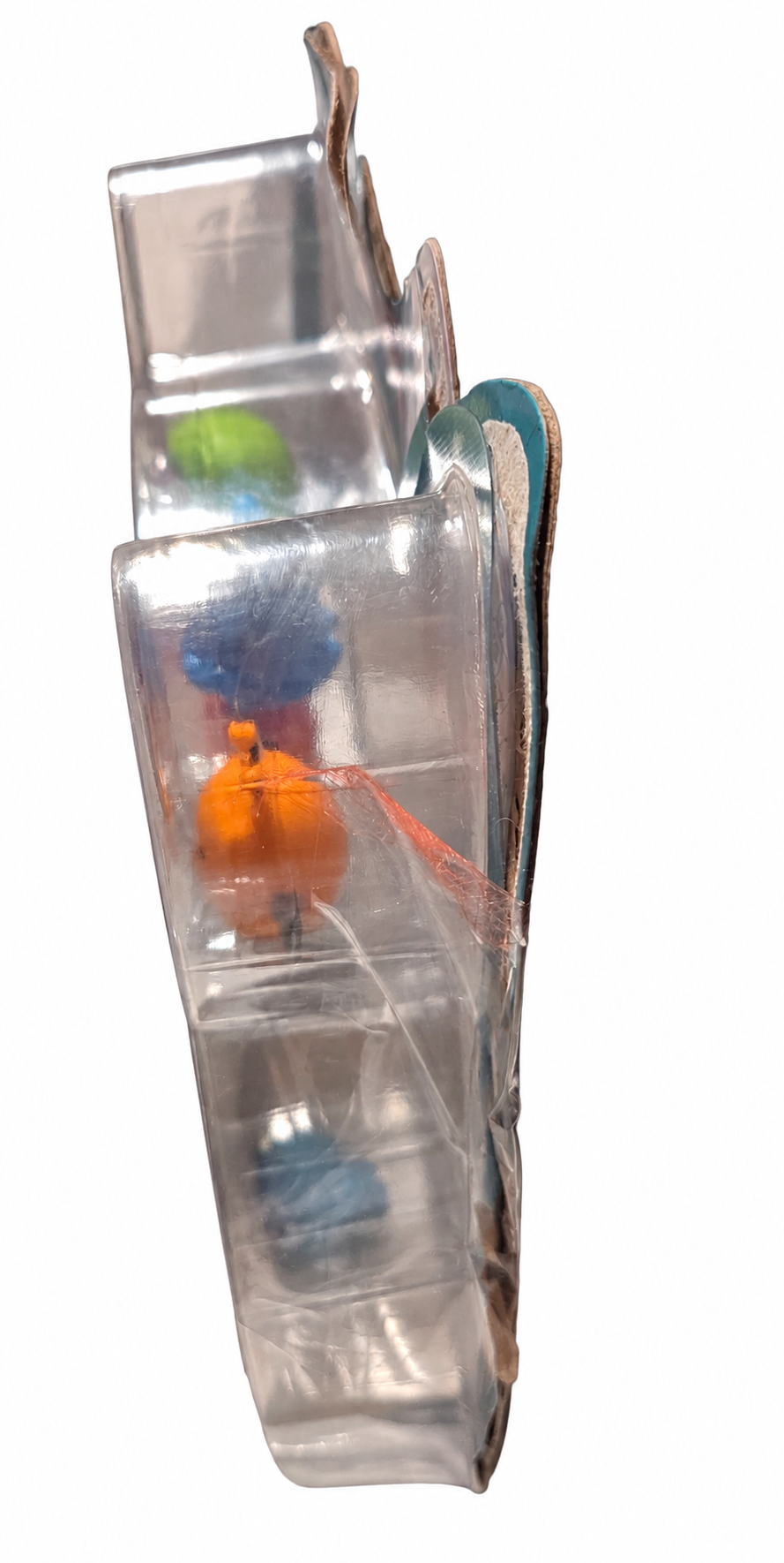 Side view showing opened blister separated from card backing