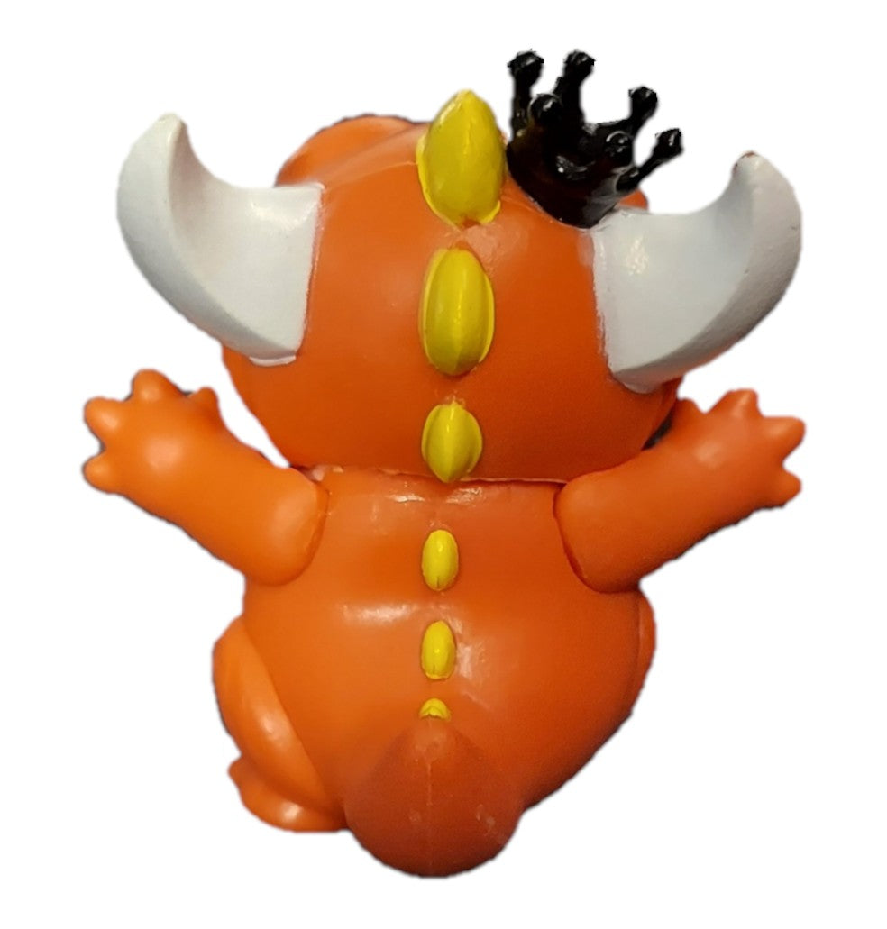 Back view of St. Nix Collectibles, Toys & Antiques Funko Paka Paka orange dragon mini figure with a black crown