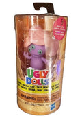 St. Nix Collectibles, Toys & Antiques Ugly Dolls Tray figure in purple with pink hair inside clear cylindrical packaging