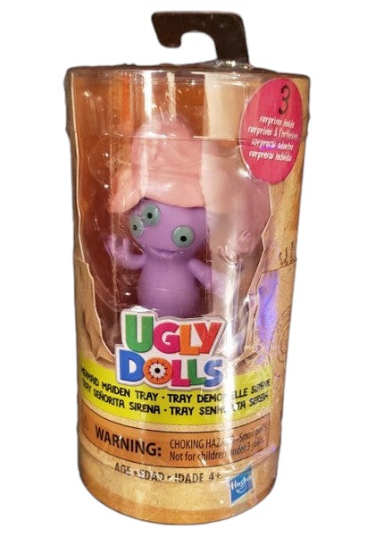 St. Nix Collectibles, Toys & Antiques Ugly Dolls Tray figure in purple with pink hair inside clear cylindrical packaging