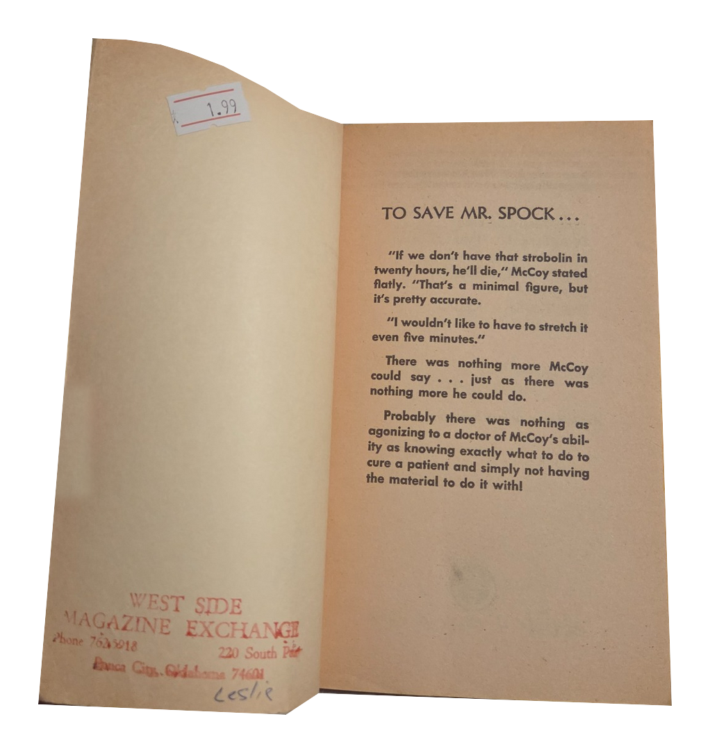 Star Trek Log Five opening pages with fingers removed on white background