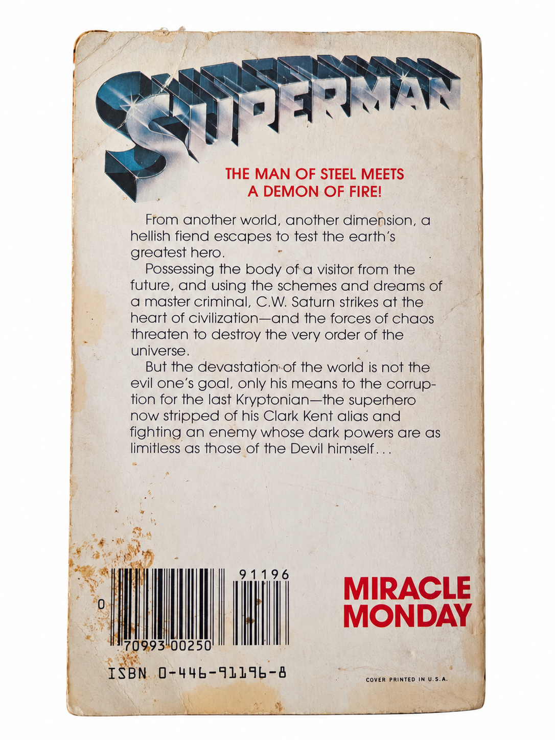 Superman Miracle Monday back cover showing wear and staining