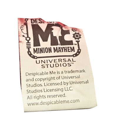 Universal Studios Despicable Me Minion Mayhem Kyle pink plush tag view on white background