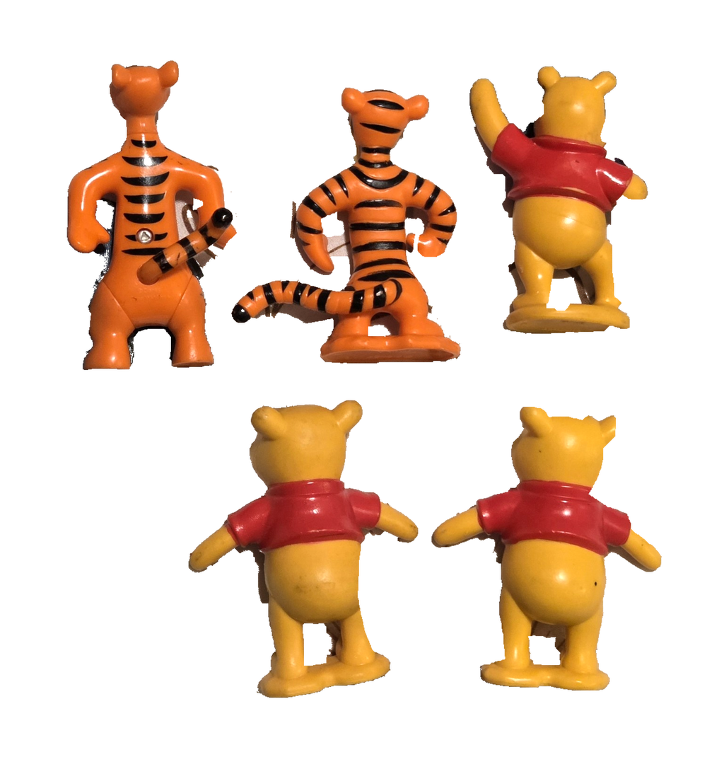 Five-piece Winnie the Pooh and Tigger figure lot, back view on white background