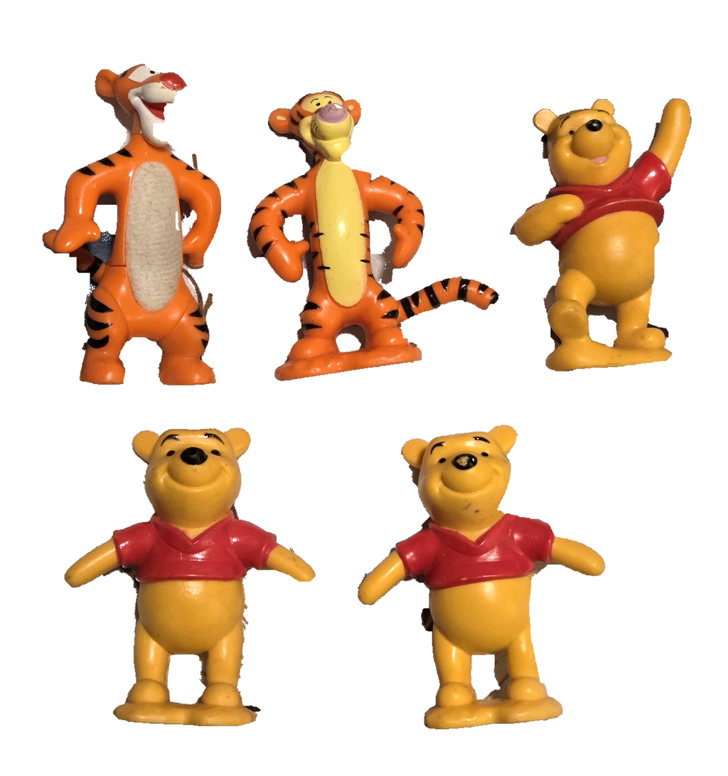 Five-piece Winnie the Pooh and Tigger figure lot, front view on white background